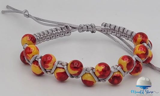 MACRAME HANDBAND WITH RED AND YELLOW BEADS
